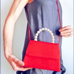 NWOT Vintage Fifth Avenue Collection red fabric purse with pearl like handle.
